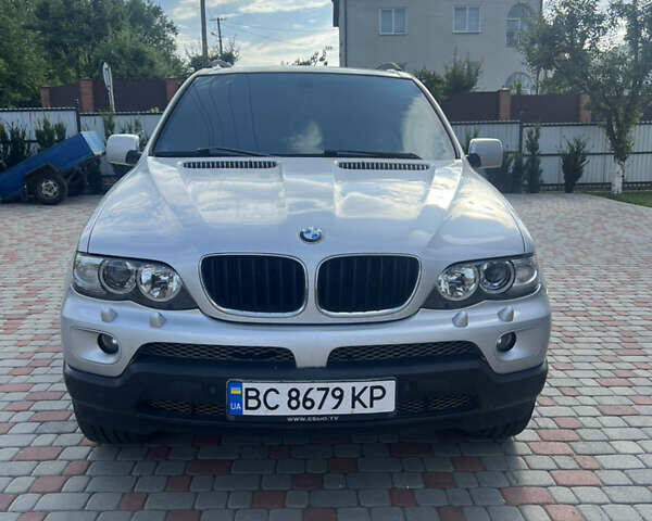 Серый БМВ Х5, объемом двигателя 3 л и пробегом 390 тыс. км за 10900 $, фото 1 на Automoto.ua