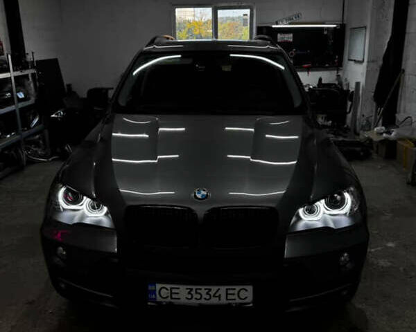 Серый БМВ Х5, объемом двигателя 3 л и пробегом 305 тыс. км за 14115 $, фото 1 на Automoto.ua