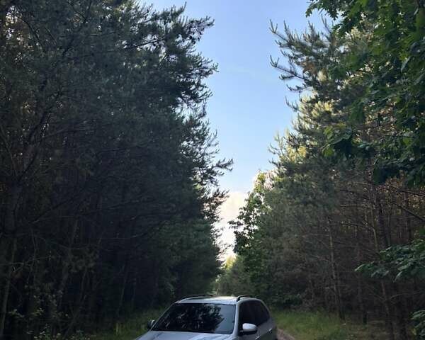 Серый БМВ Х5, объемом двигателя 3 л и пробегом 300 тыс. км за 17500 $, фото 1 на Automoto.ua