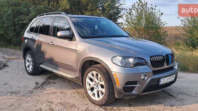 Серый БМВ Х5, объемом двигателя 3 л и пробегом 215 тыс. км за 15300 $, фото 1 на Automoto.ua