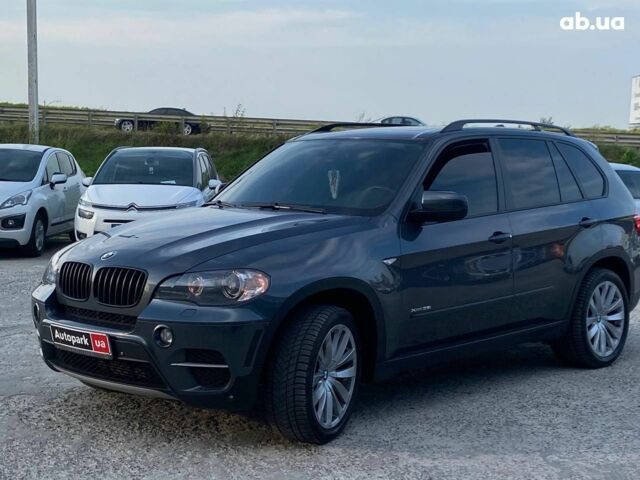 Серый БМВ Х5, объемом двигателя 3 л и пробегом 304 тыс. км за 14390 $, фото 1 на Automoto.ua