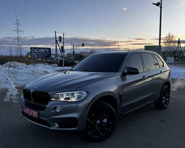 Серый БМВ Х5, объемом двигателя 3.5 л и пробегом 231 тыс. км за 23500 $, фото 1 на Automoto.ua