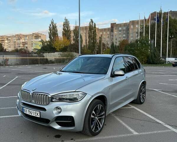 Серый БМВ Х5, объемом двигателя 3 л и пробегом 120 тыс. км за 37000 $, фото 1 на Automoto.ua