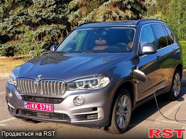 Серый БМВ Х5, объемом двигателя 2 л и пробегом 170 тыс. км за 21100 $, фото 1 на Automoto.ua