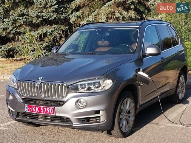 Серый БМВ Х5, объемом двигателя 2 л и пробегом 170 тыс. км за 23999 $, фото 1 на Automoto.ua