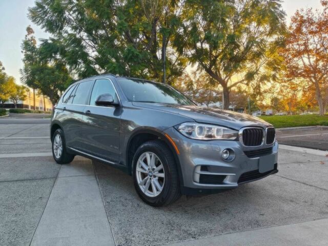 Серый БМВ Х5, объемом двигателя 3 л и пробегом 77 тыс. км за 14600 $, фото 1 на Automoto.ua