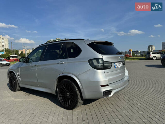 Серый БМВ Х5, объемом двигателя 2 л и пробегом 214 тыс. км за 25950 $, фото 1 на Automoto.ua