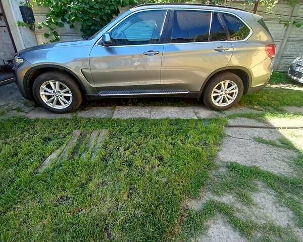 Серый БМВ Х5, объемом двигателя 3 л и пробегом 192 тыс. км за 23000 $, фото 1 на Automoto.ua