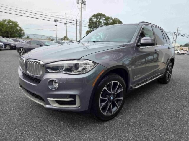 Серый БМВ Х5, объемом двигателя 3 л и пробегом 72 тыс. км за 19700 $, фото 1 на Automoto.ua