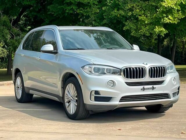 Серый БМВ Х5, объемом двигателя 3 л и пробегом 75 тыс. км за 21500 $, фото 1 на Automoto.ua