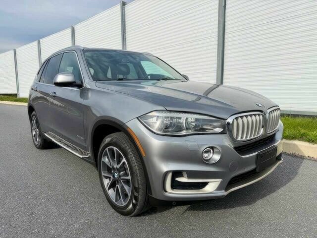 Серый БМВ Х5, объемом двигателя 3 л и пробегом 73 тыс. км за 6800 $, фото 1 на Automoto.ua