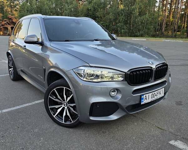 Серый БМВ Х5, объемом двигателя 3 л и пробегом 160 тыс. км за 34500 $, фото 1 на Automoto.ua