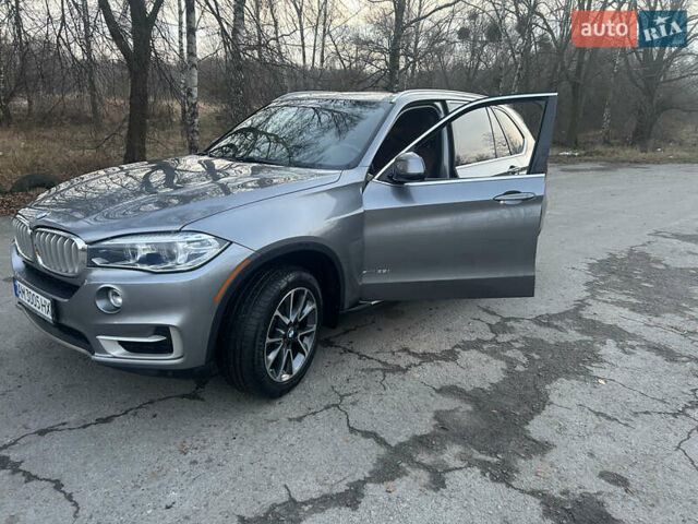 Серый БМВ Х5, объемом двигателя 3 л и пробегом 105 тыс. км за 35000 $, фото 1 на Automoto.ua