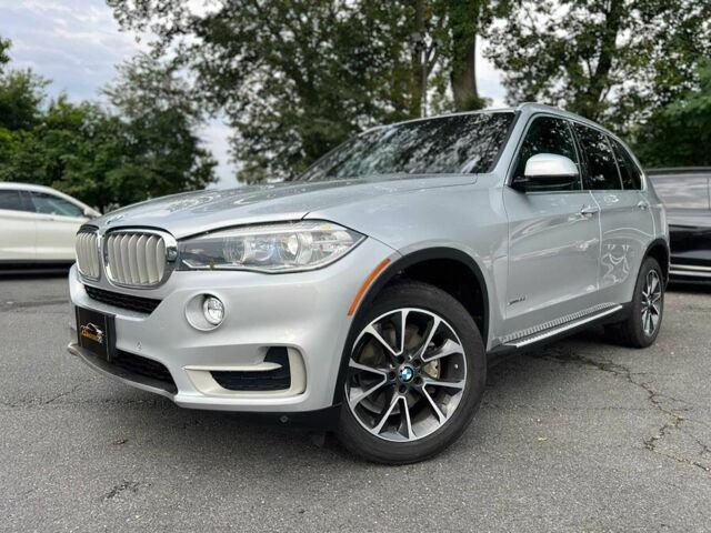 Серый БМВ Х5, объемом двигателя 3 л и пробегом 40 тыс. км за 8500 $, фото 1 на Automoto.ua