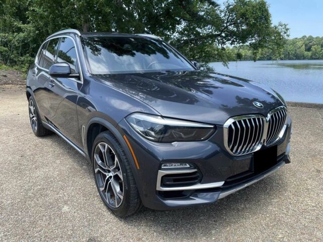 Серый БМВ Х5, объемом двигателя 3 л и пробегом 50 тыс. км за 23000 $, фото 1 на Automoto.ua