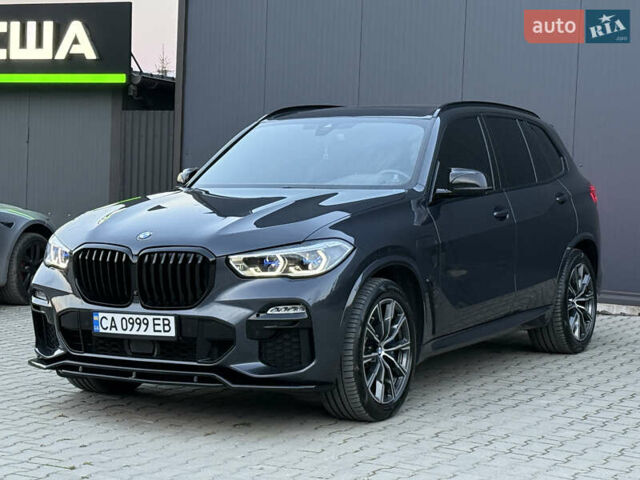 Серый БМВ Х5, объемом двигателя 3 л и пробегом 65 тыс. км за 65900 $, фото 1 на Automoto.ua