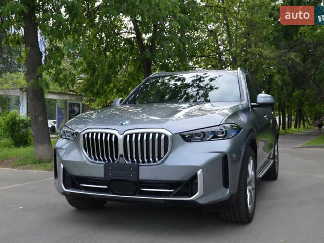 Серый БМВ Х5, объемом двигателя 3 л и пробегом 57 тыс. км за 72000 $, фото 1 на Automoto.ua