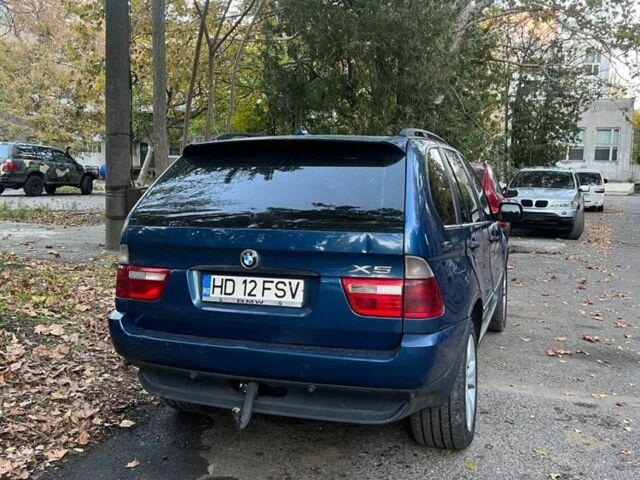 Синий БМВ Х5, объемом двигателя 3 л и пробегом 400 тыс. км за 4700 $, фото 1 на Automoto.ua