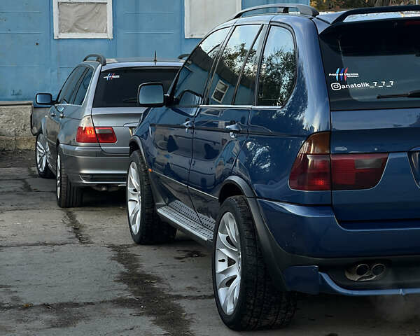 Синий БМВ Х5, объемом двигателя 4.4 л и пробегом 430 тыс. км за 7499 $, фото 1 на Automoto.ua