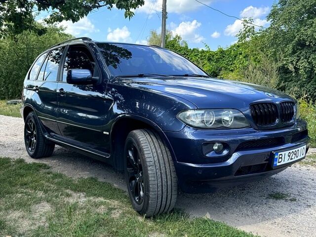 Синий БМВ Х5, объемом двигателя 3 л и пробегом 425 тыс. км за 10000 $, фото 1 на Automoto.ua