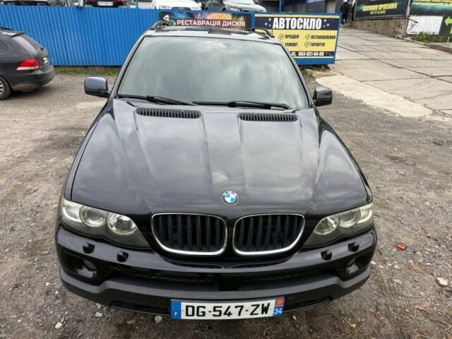 Синий БМВ Х5, объемом двигателя 3 л и пробегом 250 тыс. км за 5651 $, фото 1 на Automoto.ua