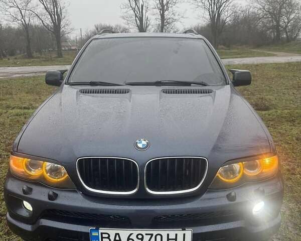 Синій БМВ Х5, об'ємом двигуна 2.99 л та пробігом 400 тис. км за 10500 $, фото 1 на Automoto.ua