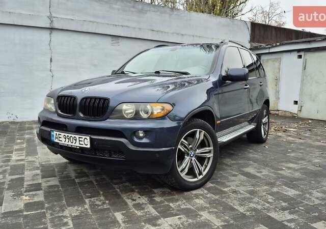 Синий БМВ Х5, объемом двигателя 4.4 л и пробегом 302 тыс. км за 8700 $, фото 1 на Automoto.ua