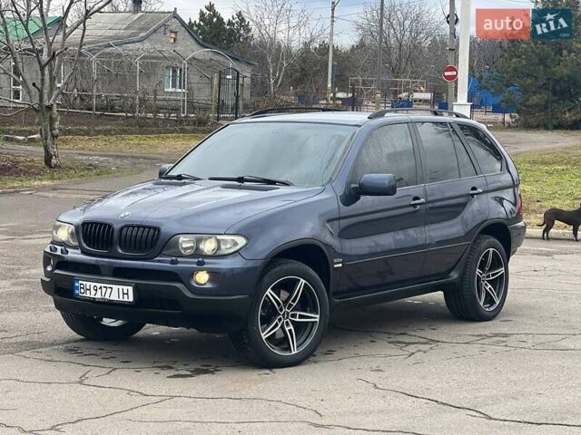 Синий БМВ Х5, объемом двигателя 3 л и пробегом 255 тыс. км за 11700 $, фото 1 на Automoto.ua