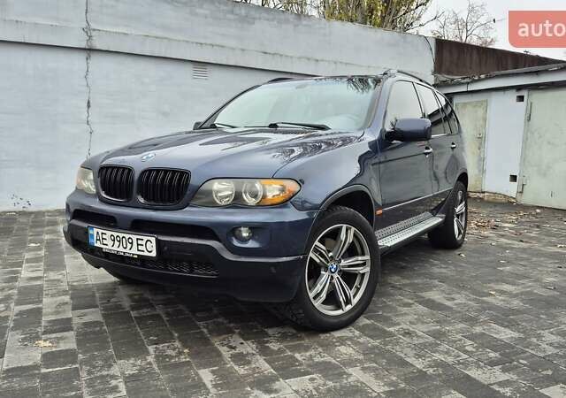 Синий БМВ Х5, объемом двигателя 4.4 л и пробегом 301 тыс. км за 8900 $, фото 1 на Automoto.ua