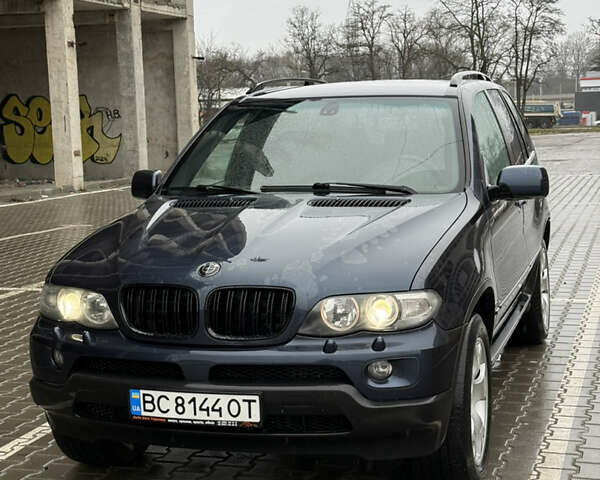 Синий БМВ Х5, объемом двигателя 2.99 л и пробегом 293 тыс. км за 11500 $, фото 1 на Automoto.ua