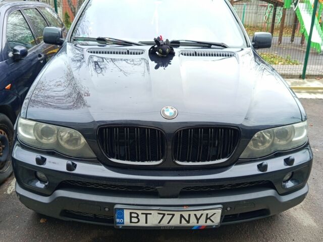 Синий БМВ Х5, объемом двигателя 3 л и пробегом 1 тыс. км за 5800 $, фото 1 на Automoto.ua