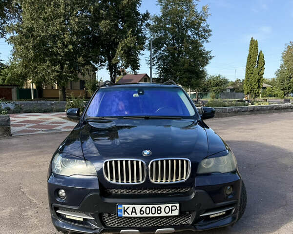 Синий БМВ Х5, объемом двигателя 3 л и пробегом 286 тыс. км за 14400 $, фото 1 на Automoto.ua