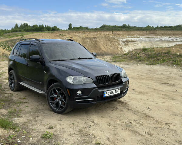 Синій БМВ Х5, об'ємом двигуна 3 л та пробігом 372 тис. км за 8999 $, фото 1 на Automoto.ua