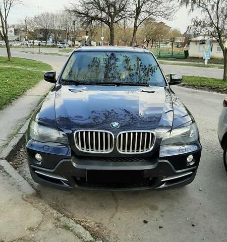 Синий БМВ Х5, объемом двигателя 3 л и пробегом 165 тыс. км за 16900 $, фото 1 на Automoto.ua