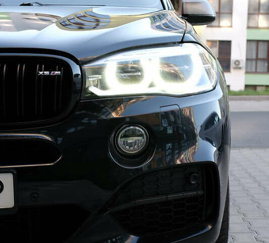 Синий БМВ Х5, объемом двигателя 3 л и пробегом 171 тыс. км за 34000 $, фото 1 на Automoto.ua