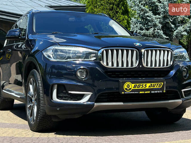 Синий БМВ Х5, объемом двигателя 3 л и пробегом 120 тыс. км за 35750 $, фото 1 на Automoto.ua