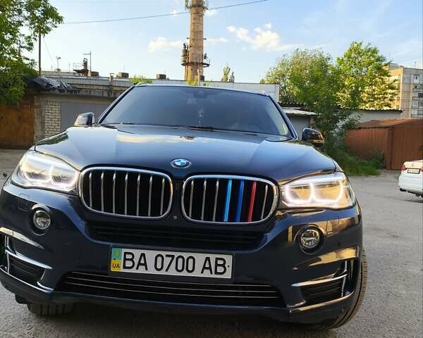 Синий БМВ Х5, объемом двигателя 3 л и пробегом 175 тыс. км за 23000 $, фото 1 на Automoto.ua