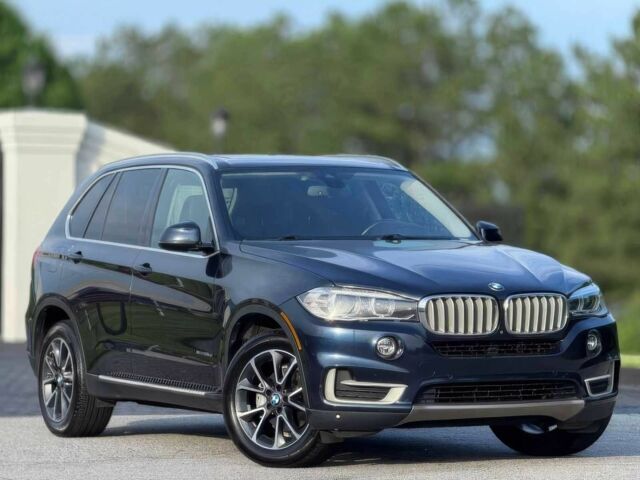 Синий БМВ Х5, объемом двигателя 3 л и пробегом 118 тыс. км за 6800 $, фото 1 на Automoto.ua