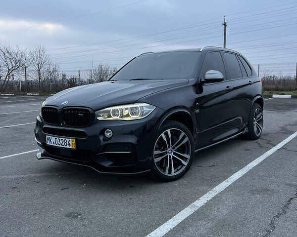 Синий БМВ Х5, объемом двигателя 3 л и пробегом 147 тыс. км за 31600 $, фото 1 на Automoto.ua