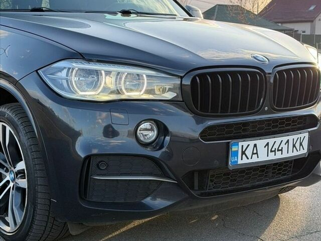 Синий БМВ Х5, объемом двигателя 3 л и пробегом 290 тыс. км за 24500 $, фото 1 на Automoto.ua