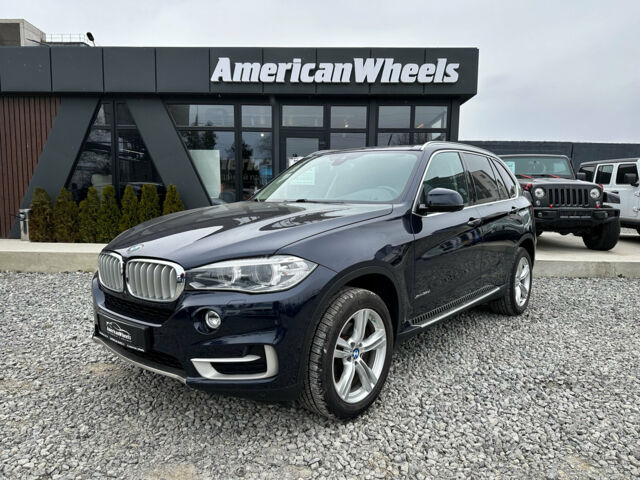 Синий БМВ Х5, объемом двигателя 3 л и пробегом 115 тыс. км за 34400 $, фото 1 на Automoto.ua