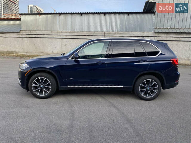 Синий БМВ Х5, объемом двигателя 2.98 л и пробегом 174 тыс. км за 21999 $, фото 1 на Automoto.ua