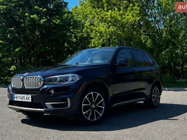Синий БМВ Х5, объемом двигателя 3 л и пробегом 143 тыс. км за 27500 $, фото 1 на Automoto.ua