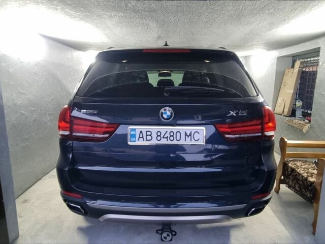 Синий БМВ Х5, объемом двигателя 2 л и пробегом 175 тыс. км за 24800 $, фото 1 на Automoto.ua