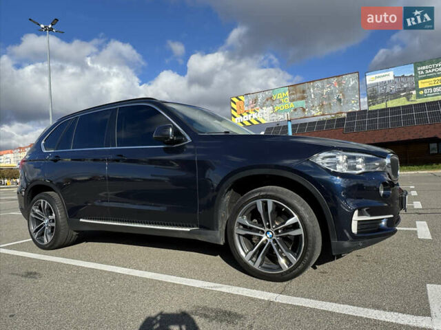 Синий БМВ Х5, объемом двигателя 2 л и пробегом 169 тыс. км за 31500 $, фото 1 на Automoto.ua
