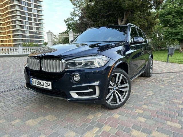Синий БМВ Х5, объемом двигателя 3 л и пробегом 74 тыс. км за 31500 $, фото 1 на Automoto.ua