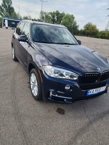 Синий БМВ Х5, объемом двигателя 2 л и пробегом 54 тыс. км за 37300 $, фото 1 на Automoto.ua
