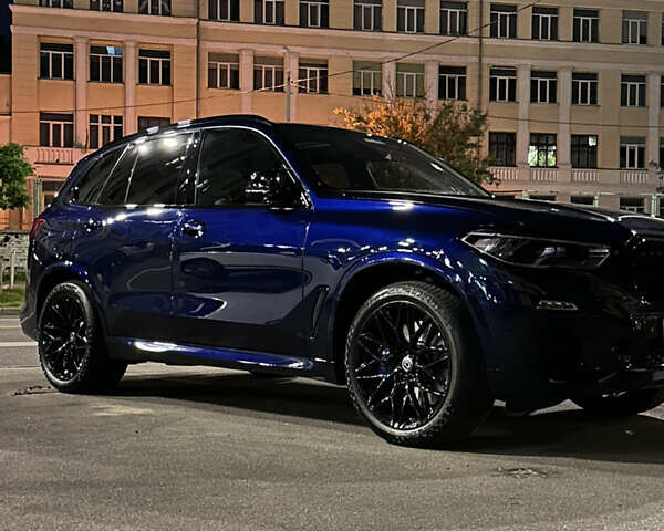 Синий БМВ Х5, объемом двигателя 3 л и пробегом 41 тыс. км за 69500 $, фото 1 на Automoto.ua