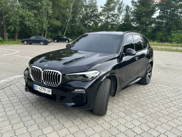 Синій БМВ Х5, об'ємом двигуна 3 л та пробігом 91 тис. км за 54000 $, фото 1 на Automoto.ua