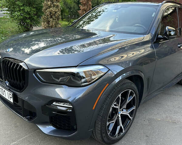 Синий БМВ Х5, объемом двигателя 3 л и пробегом 60 тыс. км за 52000 $, фото 1 на Automoto.ua